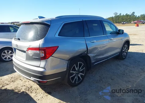 2021 Honda Pilot 2Wd Touring 7 Passenger z USA, uszkodzony, nr VIN 5FNYF5H63MB014988